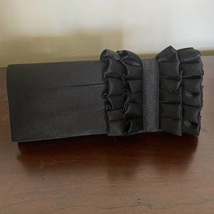 Black silk clutch with ruffles